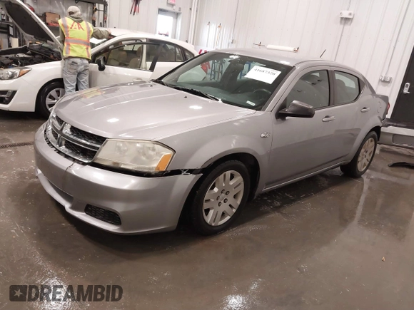 2014 Dodge Avenger SE with VIN 1C3CDZAB4EN148429, listed as a IAAI auction lot 41687320 with 149,084 mi miles and . Bid and sale history available at DreamBid. Image 18.