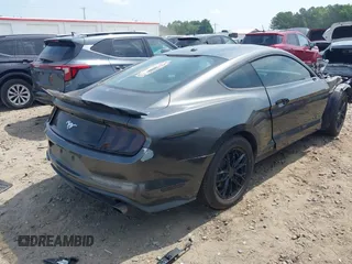 2019 Ford Mustang EcoBoost z VIN 1FA6P8TH0K5199276, wystawiony jako IAAI lot #42491713 z przebiegiem 135 710 mil mil oraz . Historia ofert i sprzedaży dostępna na DreamBid. Obrazek 4.