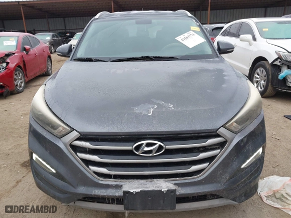 2017 Hyundai Tucson Value with VIN KM8J33A22HU358357, listed as a IAAI auction lot 41583774 with 139,338 mi miles. Bid and sale history available at carsss.com. Image 13.
