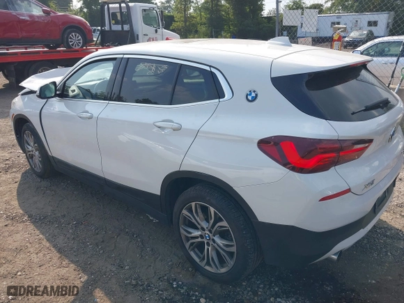 2022 BMW X2 sDrive28i with VIN WBXYH9C04N5U11829, listed as a IAAI auction lot 40184510 with 59,426 mi miles. Bid and sale history available at carsss.com. Image 3.