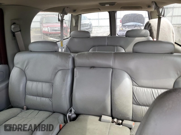 1999 Chevrolet Suburban z VIN 1GNFK16R2XJ328550, wystawiony jako Copart lot #53179525 z przebiegiem 170 914 mil mil oraz Czysty tytuł • Clean title. Historia ofert i sprzedaży dostępna na DreamBid. Obrazek 10.