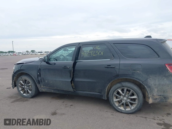2014 Dodge Durango SXT with VIN 1C4RDJAG1EC552075, listed as a IAAI auction lot 42292301 with 122,427 mi miles and . Bid and sale history available at DreamBid. Image 14.