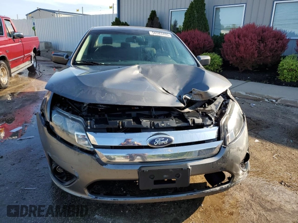 2012 Ford Fusion SE z VIN 3FAHP0HA0CR437115, wystawiony jako Copart lot #56583495 z przebiegiem 159 649 mil mil oraz Szkoda całkowita • Salvage title. Historia ofert i sprzedaży dostępna na DreamBid. Obrazek 5.