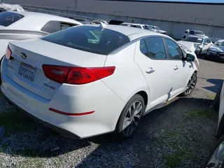 2015 Kia Optima SX Turbo with VIN 5XXGR4A67FG517902, listed as a IAAI auction lot 41629985 with 1 mi miles. Bid and sale history available at carsss.com. Image 4.