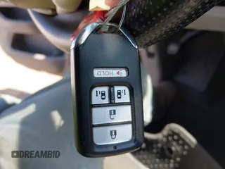 2016 Honda Odyssey SE with VIN 5FNRL5H33GB125693, listed as a IAAI auction lot 41994036 with 163,617 mi miles and . Bid and sale history available at DreamBid. Image 11.