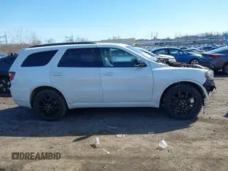 2019 Dodge Durango GT Plus with VIN 1C4RDJDG6KC561006, listed as a IAAI auction lot 41819583 with 53,395 mi miles and . Bid and sale history available at DreamBid. Image 12.