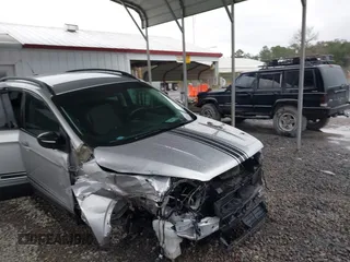 2018 Ford Escape SE z VIN 1FMCU9GD1JUB35184, wystawiony jako IAAI lot #41611285 z przebiegiem 142 267 mil mil oraz . Historia ofert i sprzedaży dostępna na DreamBid. Obrazek 6.