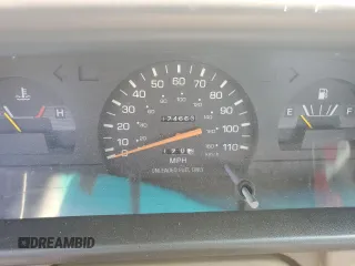 1994 Toyota T100 z VIN JT4VD20A1R0013626, wystawiony jako Copart lot #55592885 z przebiegiem 174 663 mil mil oraz Szkody całkowita. Historia ofert i sprzedaży dostępna na DreamBid. Obrazek 9.