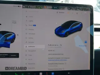 2018 Tesla Model 3 Long Range Battery with VIN 5YJ3E1EA7JF057031, listed as a IAAI auction lot 42139832 with 92,618 mi miles and . Bid and sale history available at DreamBid. Image 7.