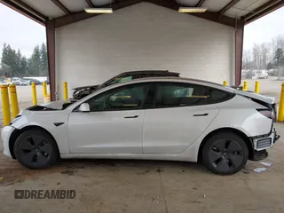 2023 Tesla Model 3 z VIN 5YJ3E1EA8PF412166, wystawiony jako IAAI lot #41461983 z przebiegiem 25 908 mil mil oraz . Historia ofert i sprzedaży dostępna na DreamBid. Obrazek 14.