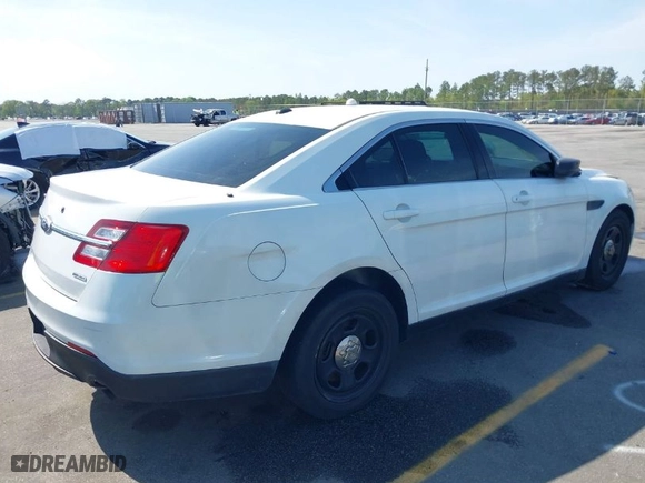 2013 Ford Sedan Police Interceptor with VIN 1FAHP2M84DG160041, listed as a IAAI auction lot 41922831 with 182,343 mi miles. Bid and sale history available at carsss.com. Image 4.
