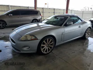 2009 Jaguar XK with VIN SAJWA44B595B31777, listed as a Copart auction lot 52026515 with Not Provided miles and Clean Title. Bid and sale history available at DreamBid. Image 1.