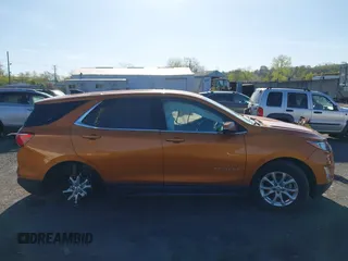2018 Chevrolet Equinox LT with VIN 2GNAXSEV6J6124161, listed as a IAAI auction lot 42128338 with 69,105 mi miles and . Bid and sale history available at carsss.com. Image 13.