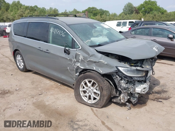 2022 Chrysler Pacifica Touring L with VIN 2C4RC1BG9NR142830, listed as a IAAI auction lot 42412136 with 104,964 mi miles and . Bid and sale history available at DreamBid. Image 1.