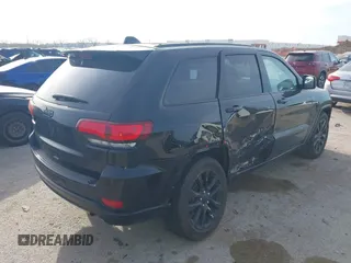 2018 Jeep Grand Cherokee Laredo E with VIN 1C4RJEAG4JC311699, listed as a IAAI auction lot 41876920 with 42,584 mi miles and . Bid and sale history available at DreamBid. Image 4.