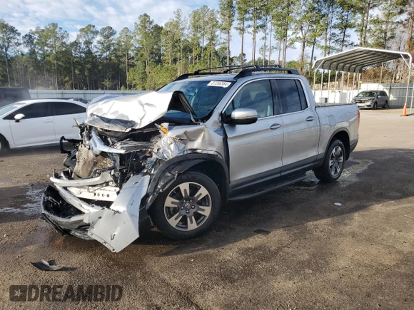 2017 Honda Ridgeline RTL-T with VIN 5FPYK2F6XHB002959, listed as a Copart auction lot 87286384 with 97,749 mi miles and Salvage title. Bid and sale history available at DreamBid. Image 1.