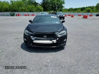 2014 Scion FR-S z VIN JF1ZNAA16E8702957, wystawiony jako Copart lot #58801915 z przebiegiem 114 656 mil mil oraz Szkoda całkowita • Salvage title. Historia ofert i sprzedaży dostępna na DreamBid. Obrazek 13.