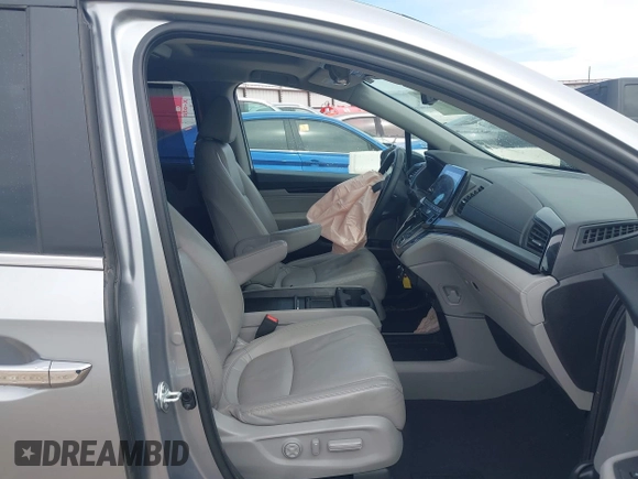 2021 Honda Odyssey Touring with VIN 5FNRL6H8XMB034837, listed as a IAAI auction lot 41856444 with 84,950 mi miles. Bid and sale history available at carsss.com. Image 5.