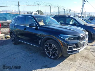 2023 BMW X5 sDrive40i with VIN 5UXCR4C00P9P46054, listed as a IAAI auction lot 41627025 with 20,152 mi miles. Bid and sale history available at carsss.com. Image 1.