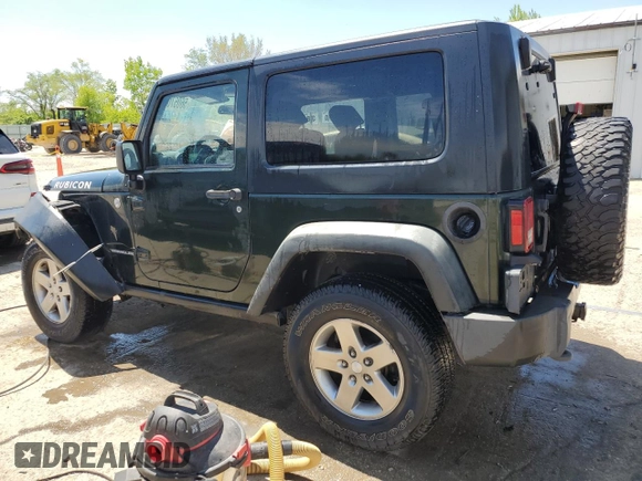 2010 Jeep Wrangler Rubicon with VIN 1J4BA6D12AL221220, listed as a Copart auction lot 56057055 with 200,346 mi miles and Salvage title. Bid and sale history available at DreamBid. Image 2.