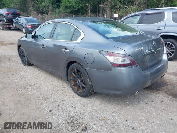 2014 Nissan Maxima S with VIN 1N4AA5AP6EC450628, listed as a IAAI auction lot 42624341 with 188,379 mi miles and . Bid and sale history available at DreamBid. Image 3.