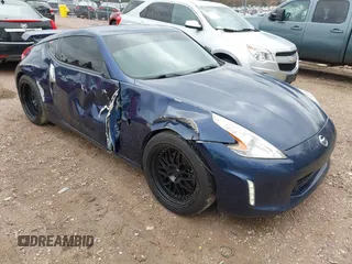 2014 Nissan 370Z Nismo z VIN JN1AZ4EH8EM636474, wystawiony jako IAAI lot #42084551 z przebiegiem 87 166 mil mil oraz . Historia ofert i sprzedaży dostępna na DreamBid. Obrazek 1.
