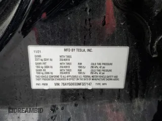 2022 Tesla Model Y Long Range z VIN 7SAYGDEE0NF327147, wystawiony jako Copart lot #58422885 z przebiegiem 39 021 mil mil oraz Szkody całkowita. Historia ofert i sprzedaży dostępna na DreamBid. Obrazek 13.