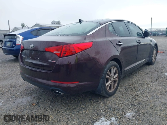 2013 Kia Optima EX with VIN 5XXGN4A74DG111397, listed as a IAAI auction lot 41977063 with 113,571 mi miles. Bid and sale history available at carsss.com. Image 4.