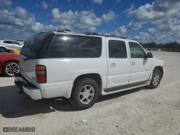 2004 GMC Yukon XL Denali with VIN 1GKFK66U84J258384, listed as a Copart auction lot 76179964 with 0 mi miles and Salvage Title. Bid and sale history available at carsss.com. Image 3.