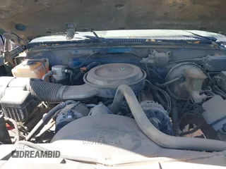 1995 GMC Sierra 1500 z VIN 2GTEK19K1S1553693, wystawiony jako IAAI lot #41742522 z przebiegiem 276 637 mil mil oraz . Historia ofert i sprzedaży dostępna na DreamBid. Obrazek 10.