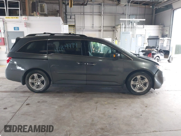 2011 Honda Odyssey Touring с VIN 5FNRL5H90BB025855, выставлен на аукционе IAAI как лот 42104979 с пробегом 165 010 миль миль и . История ставок и продаж доступна на DreamBid. Изображение 14.
