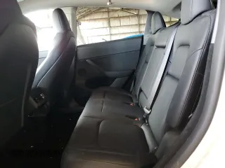 2024 Tesla Model Y Long Range with VIN 7SAYGDEE1RF165311, listed as a Copart auction lot 51711665 with 15,190 mi miles and Salvage Title. Bid and sale history available at DreamBid. Image 10.
