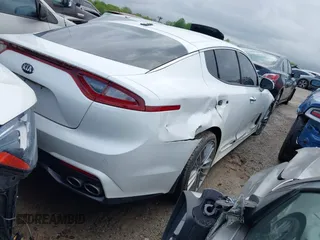 2018 Kia Stinger with VIN KNAE15LA1J6029913, listed as a IAAI auction lot 41477274 with 105,479 mi miles. Bid and sale history available at carsss.com. Image 4.