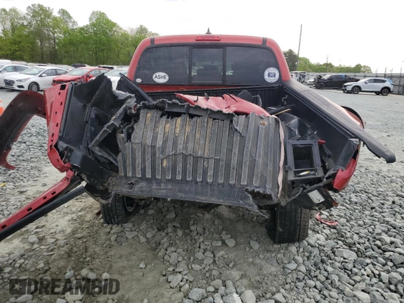 2015 Toyota Tacoma with VIN 3TMLU4ENXFM183250, listed as a Copart auction lot 52936125 with 132,703 mi miles and Salvage Title. Bid and sale history available at DreamBid. Image 6.