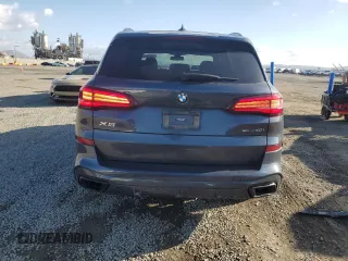 2022 BMW X5 sDrive40i with VIN 5UXCR4C01N9L48915, listed as a Copart auction lot 48074965 with 36,945 mi miles and Salvage Title. Bid and sale history available at carsss.com. Image 6.