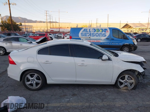 2012 Volvo S60 T5 z VIN YV1622FS7C2041060, wystawiony jako IAAI lot #41319044 z przebiegiem Nie podano mil oraz . Historia ofert i sprzedaży dostępna na DreamBid. Obrazek 13.