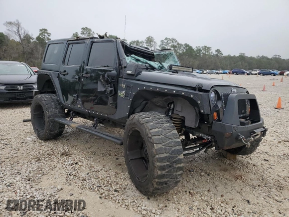 2012 Jeep Wrangler Unlimited Rubicon with VIN 1C4HJWFG7CL205244, listed as a Copart auction lot 86651914 with Not provided miles and Salvage title. Bid and sale history available at DreamBid. Image 4.