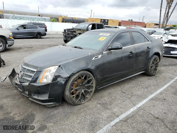 2011 Cadillac CTS Sedan with VIN 1G6DA5EY7B0132575, listed as a Copart auction lot 72469184 with 124,370 mi miles and Salvage Title. Bid and sale history available at carsss.com. Image 1.