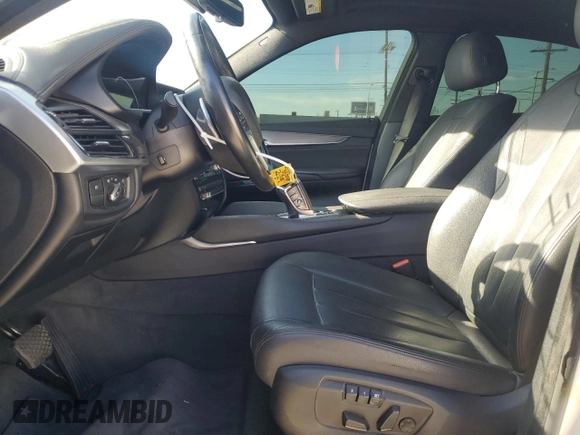 2017 BMW X6 sDrive35i with VIN 5UXKU0C50H0F99774, listed as a Copart auction lot 79570354 with 56,086 mi miles and Salvage Title. Bid and sale history available at carsss.com. Image 7.
