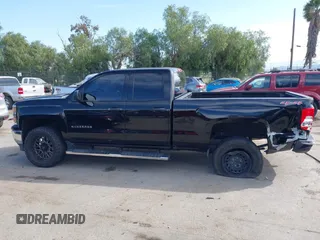 2014 Chevrolet Silverado 1500 LT with VIN 1GCVKREC7EZ417660, listed as a IAAI auction lot 41993599 with 137,025 mi miles and . Bid and sale history available at DreamBid. Image 14.