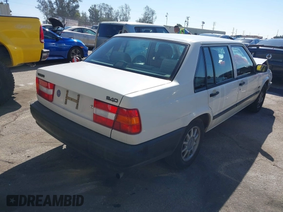 1994 Volvo 900 Action z VIN YV1JS8311R1169592, wystawiony jako IAAI lot #41647893 z przebiegiem 287 426 mil mil oraz . Historia ofert i sprzedaży dostępna na DreamBid. Obrazek 4.