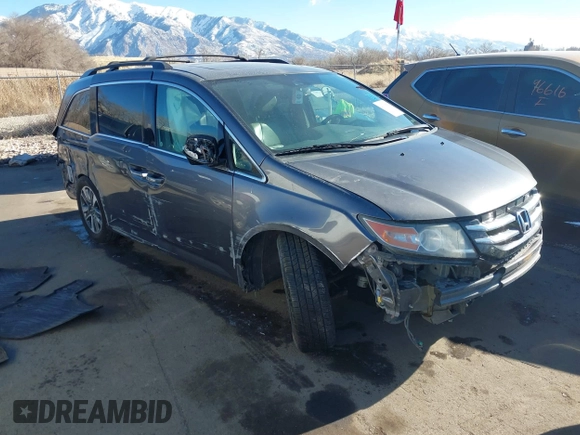 2015 Honda Odyssey Touring Elite with VIN 5FNRL5H98FB024958, listed as a IAAI auction lot 41361558 with 212,806 mi miles and . Bid and sale history available at DreamBid. Image 1.