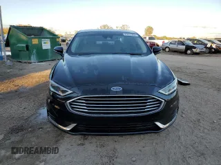 2019 Ford Fusion Hybrid SEL with VIN 3FA6P0MU7KR260813, listed as a Copart auction lot 73311492 with 70,783 mi miles. Bid and sale history available at carsss.com. Image 5.