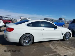 2015 BMW 4 Series 428i with VIN WBA3N3C51FK232902, listed as a IAAI auction lot 41547137 with 136,306 mi miles and . Bid and sale history available at DreamBid. Image 13.