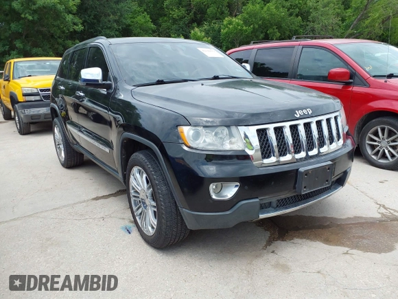 2013 Jeep Grand Cherokee Overland with VIN 1C4RJECT2DC588124, listed as a IAAI auction lot 42142573 with 204,309 mi miles and . Bid and sale history available at DreamBid. Image 1.