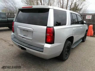 2016 Chevrolet Tahoe Commercial with VIN 1GNSKDEC5GR368328, listed as a IAAI auction lot 41975629 with 104,205 mi miles. Bid and sale history available at carsss.com. Image 4.