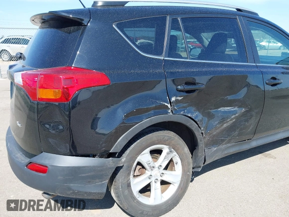 2013 Toyota RAV4 XLE with VIN 2T3WFREV0DW019201, listed as a IAAI auction lot 42145998 with 185,124 mi miles and . Bid and sale history available at DreamBid. Image 6.