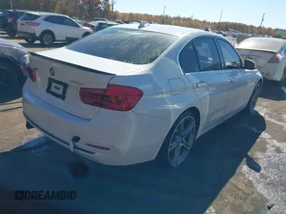 2018 BMW 3 Series 330i xDrive with VIN WBA8D9G54JNU72412, listed as a IAAI auction lot 40660769 with 58,668 mi miles. Bid and sale history available at carsss.com. Image 4.
