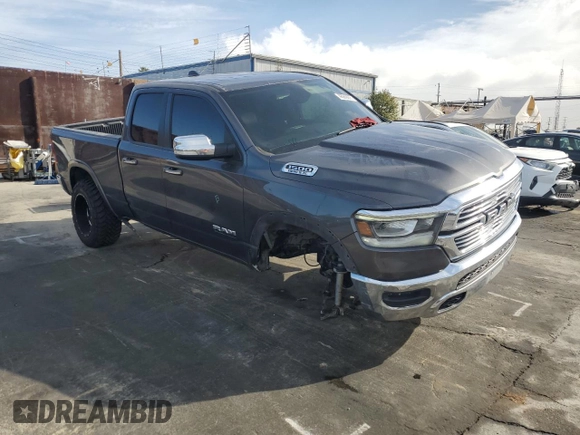 2020 Ram 1500 Laramie with VIN 1C6SRFDT1LN263036, listed as a Copart auction lot 48560655 with 130,923 mi miles and Salvage Title. Bid and sale history available at carsss.com. Image 4.