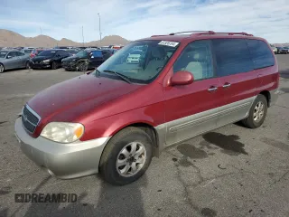 2004 Kia Sedona LX with VIN KNDUP131546612432, listed as a Copart auction lot 87326764 with 156,259 mi miles and Salvage Title. Bid and sale history available at carsss.com. Image 1.
